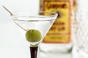 cocktail with martini and olive