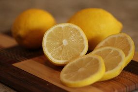 juicy lemon slices on a cutting board