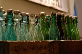 dirty bottles in a drawer