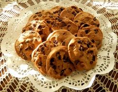 cookies with chocolate chips on a white napkin