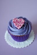sweet purple cupecake with a pink heart