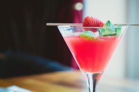 pink cocktail with mint and strawberries