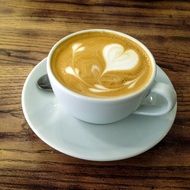 freshly brewed cappuccino with a heart-shaped foam
