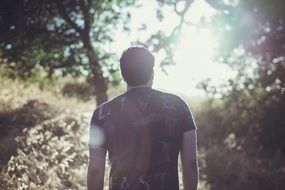 man person male back looking sunshine