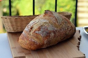 freshly baked rye bread on a wooden table