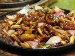 Asian dish with squid and onion