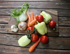 fresh organic vegetables on wooden table