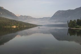 fog lake mountain water reflection