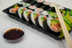 sushi rolls with avocados salmon and cream cheese