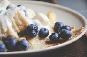 pancakes with ice cream and blueberries for breakfast