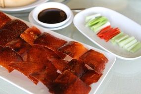 Chinese roasted duck with vegetables and soy sauce