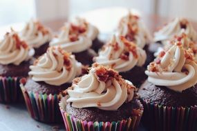 red velvet cupcakes with a bunch of frosting on top