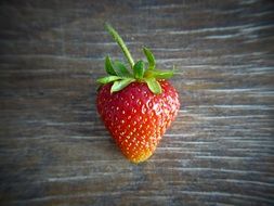 appetizing strawberry fruit on the wooden surface