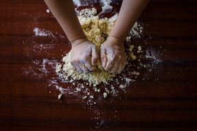 person making dough for a pastry