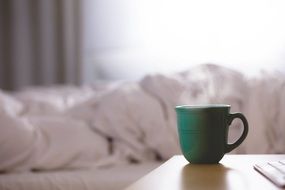 cup of coffee on the edge of the table