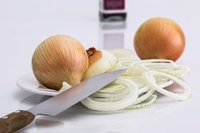 onion sliced by knife