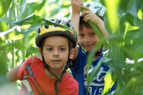 children on a green field