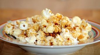 plate full of hot crunchy popcorn