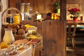 breakfast buffet in a hotel restaurant set up for guests