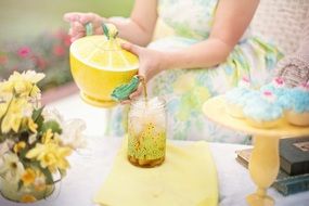 lemon as a kettle in children's hands