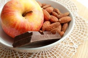 apple, almond and chocolate for a healthy snack