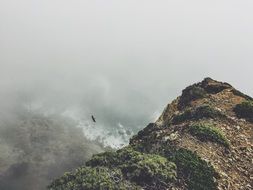 fog on the top of the mountain