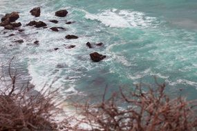 landscape of waves and foam on the shoreline