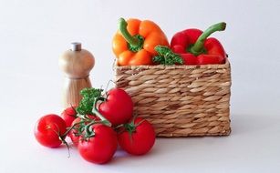 tomatoes and paprika in a basket