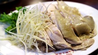 chicken dish on a white plate