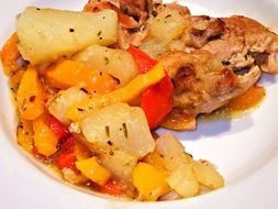 roasted chicken with potatoes and spices