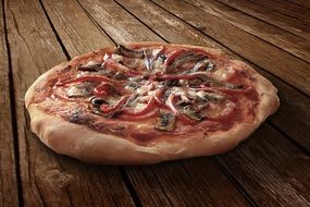 pizza on a wooden table in a restaurant