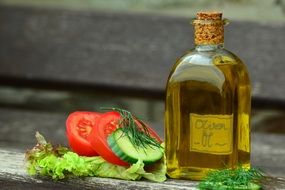 olive oil in a bottle for fresh vegetables