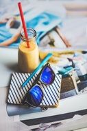 blue sunglasses near a healthy snack