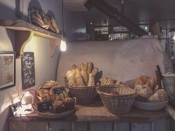 breads in a baskets on a kitchen