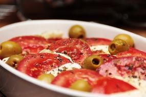 tomatoes with mozzarella and olives