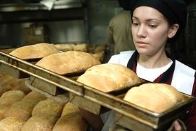 girl near freshly baked bread