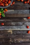 wood background cherry tomatoes