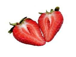 cut strawberries in half on a white background