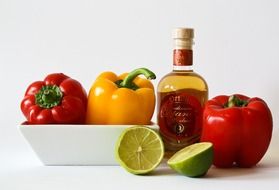 vegetables and white wine bottle