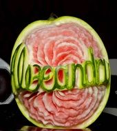 text carved on watermelon