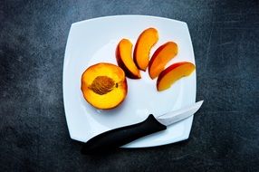 peach snack fruit food healthy Knife white plate