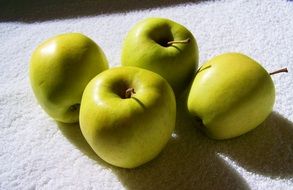 Closeup photo of the yellow green apples