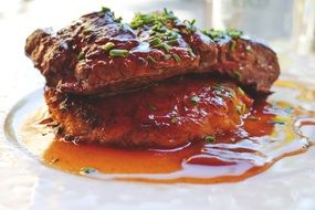 steak with sauce on a plate