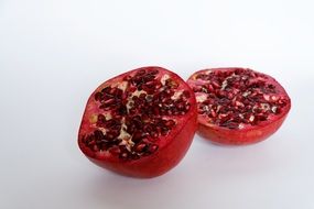 two parts of red pomegranate