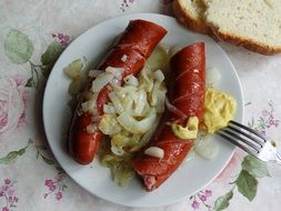 Photo of Delicious lunch with fried sausages