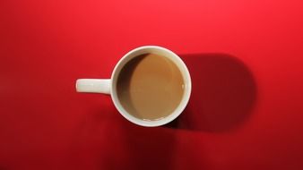 coffee cup on red table