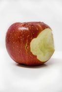 closeup picture of red Apple bitten off