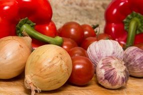 red bell pepper, garlic and delicious tomatoes