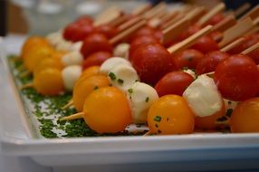 orange red tomato mozzarella snack