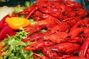 boiled crayfish with vegetables and herbs